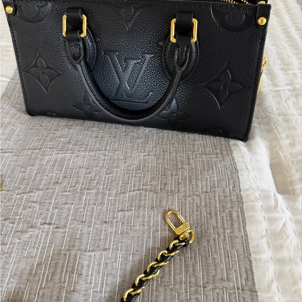 Louis Vuitton Black Satchel with Gold Hardware